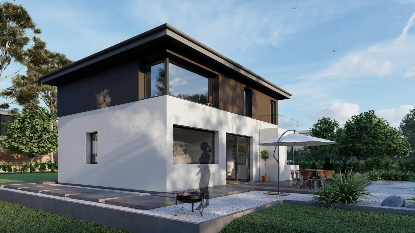 Einfamilienhaus mit Satteldach, weißer Fassade und überdachter Terrasse mit Sonnenschirm